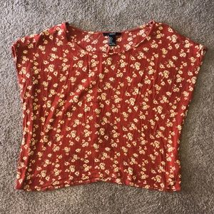 Orange floral top w/ a round neck
